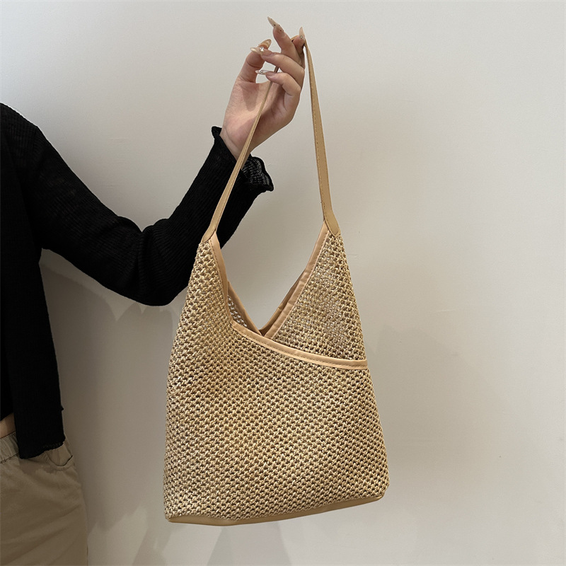 Bolsas de tejido a mano para mujeres 2024 nueva moda retro bolsas de balde de moda vacaciones bolsas de paja de moda bolsas de hombro