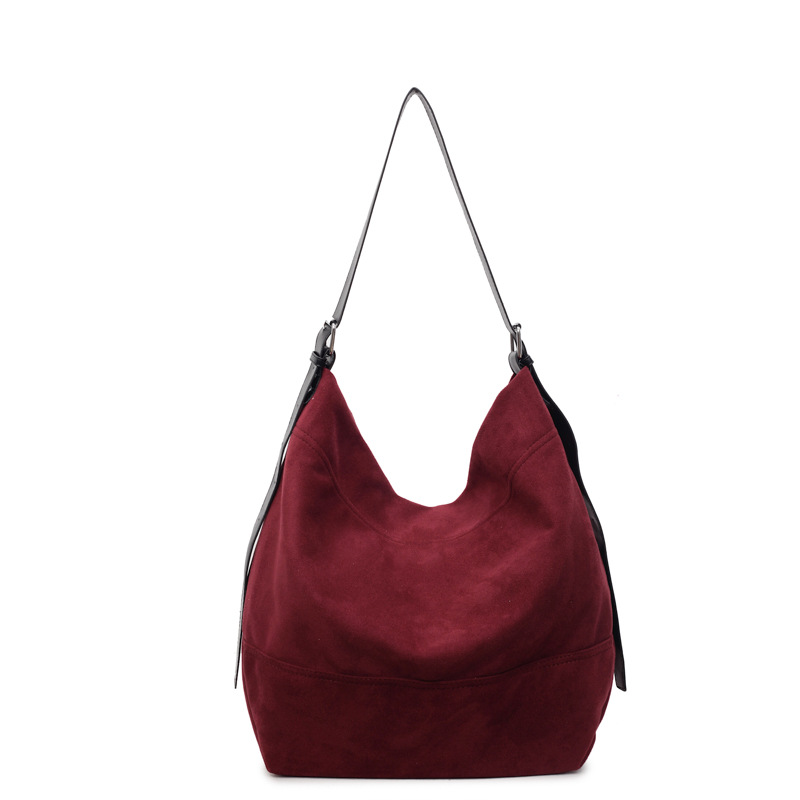 Bolsa de cubo de gran capacidad esmerizada transfronteriza para mujeres 2025, otoño y invierno, nueva bolsa de hombro coreana de alto valor de cara, bolsa de tendencia debajo de la axila