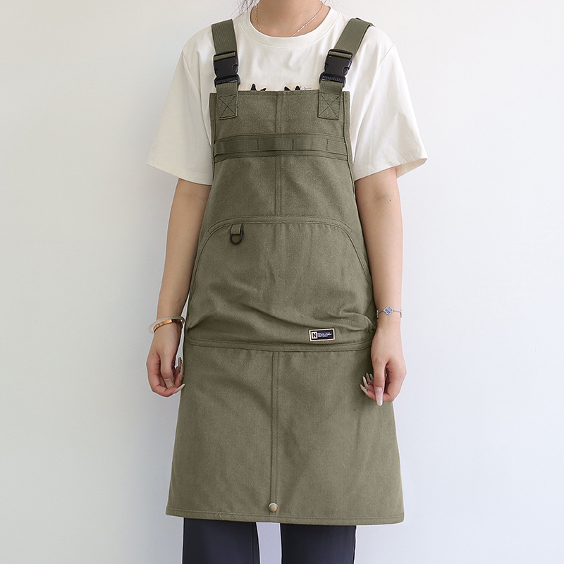 Nuevo delantal de lona gruesa transfronterizo de alto valor de bolsillo herramientas delantal japonés logotipo personalizado vestido de corte de pelo