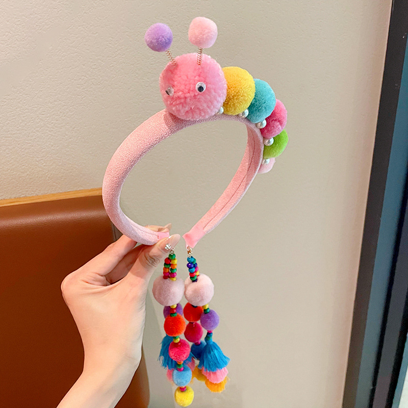 Fuchsia headband with tassels