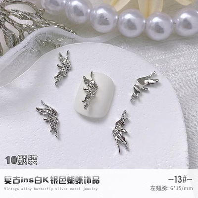 2023 Internet Celebrity nueva aleación de uñas joyería vintage blanco K serie aleación mariposa joyería accesorios de aleación