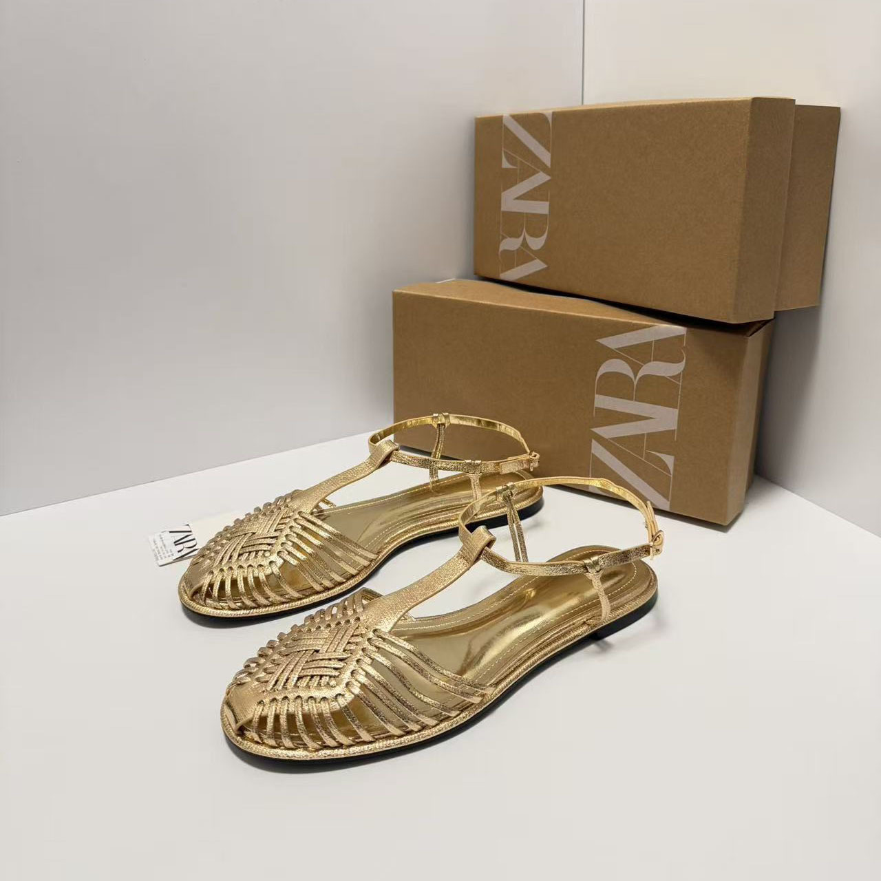 ZA2026 nuevo retro cabeza redonda plana zapatos romanos tejidos huecos hebilla de moda sandalias de cabeza