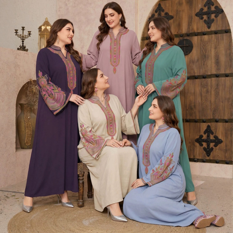 Plus-Size Ethnic Style Long Loose Dress with Small V-Neck, Slightly Satin-Like Drape, Embroidery, and Contrasting Color Design. Ethnic Style