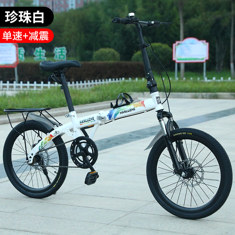 Pearl white single speed shock absorbing spoke wheel rear seat