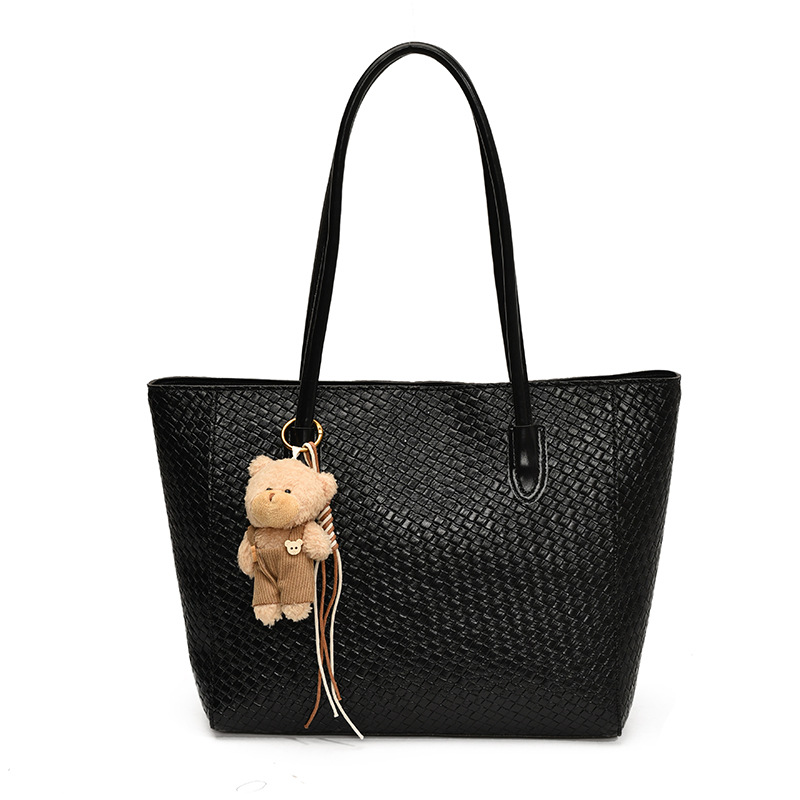 Bolsa de moda retro de gran capacidad para mujeres 2025 nueva bolsa de hombro transfronteriza simple textura casual bolso de abrigo