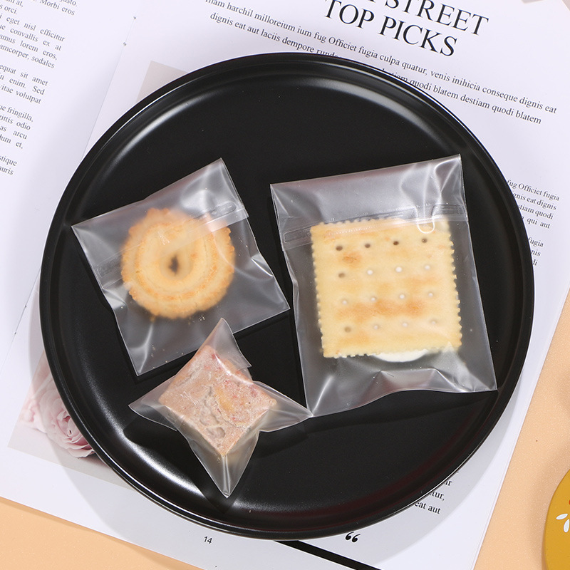 Bolsa autoadhesiva translúcida esmerilada gruesa bolsa de galletas copo de nieve pastel de carne crujiente bolsa de embalaje de plástico bolsa de autosellado de viscosa