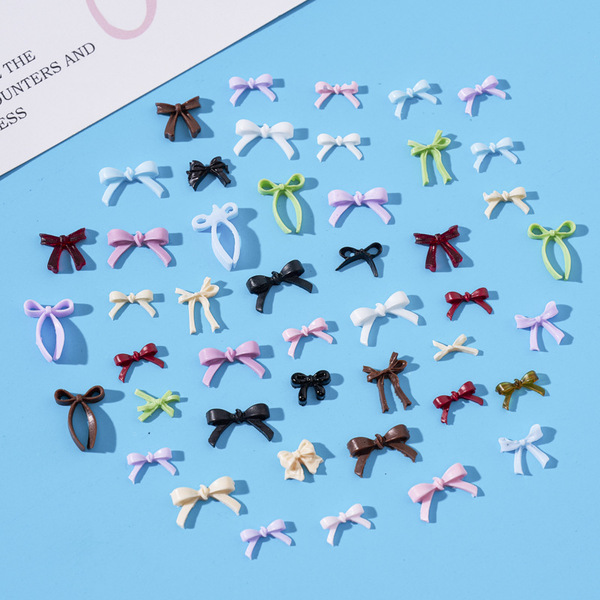 Small three dimensional bow tie with bow