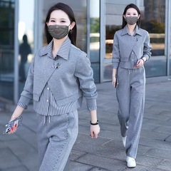 山力達迪レジャースポーツスーツの女性の春の新型の襟のストライプは偽の2つの衛衣のストレートパンツをつなぎ合わせます。