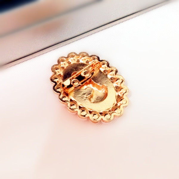 Small brooch