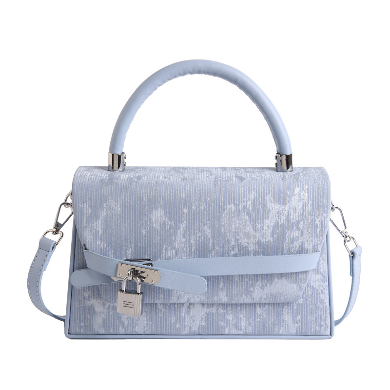 Tendencia transfronteriza coreana bolso de mano bolso de mujer 2026 primavera nuevo color sólido bolso de hombro extranjero bolso de viaje