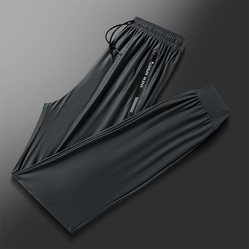 Pantalones de verano de hielo para hombres pantalones casuales de aire acondicionado pantalones delgados transpirables pantalones deportivos elásticos pantalones grandes transfronterizos rápidos