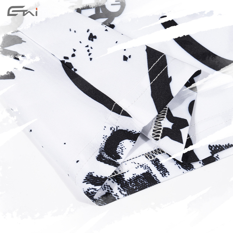 Marca de moda ropa de hombre impresa graffiti viento juego deportivo casual camisa suelta pantalones cortos de verano de dos piezas