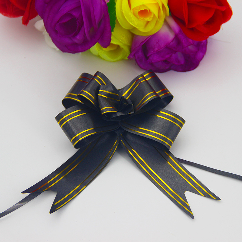 Fabricante al por mayor de empaques de flores para regalos navideños, cinta con borde dorado, 30 flores medianas atadas a mano.