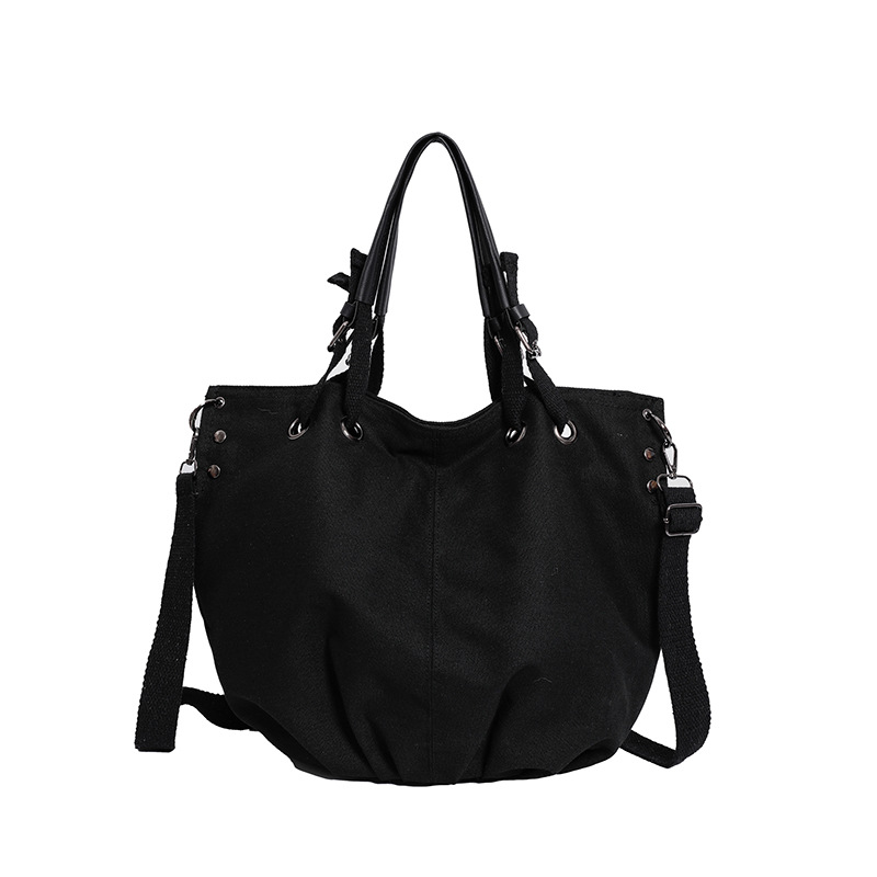 Este año popular universal nicho japonés VW lienzo de gran capacidad 2024 estilo de estilo occidental retro portátil clase de viaje mochila