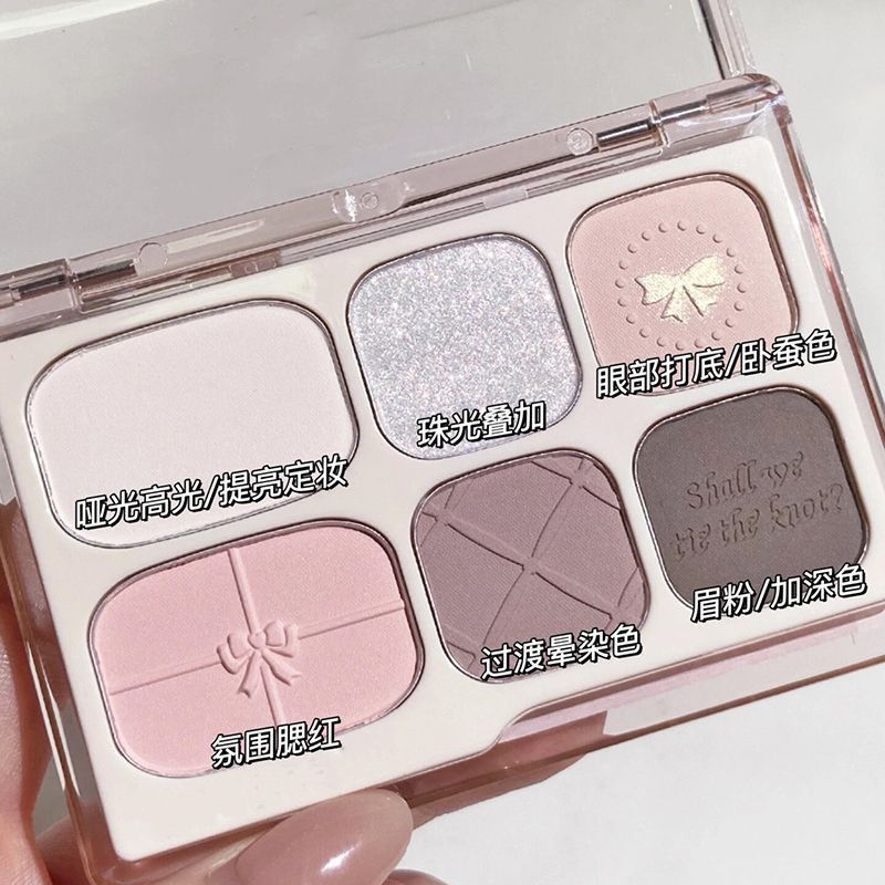 Bandeja de sombra de ojos de seis colores con lazo, rosa gris mate nacarado de baja saturación, rubor de alto brillo de color tierra, maquillaje falso