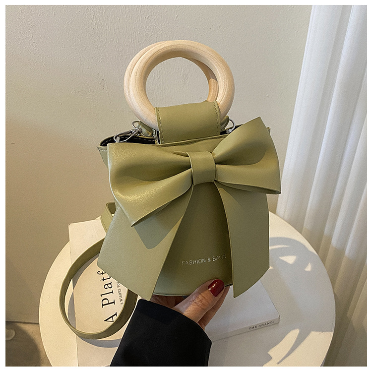 455g Weight Synthetic Leather Lining Material Sewing Thread Fashion Element Magnetic Buckle Closure Type Single Shoulder Strap, Double Handle Strap Type Bucket Bag Bags Type Casual Occasion Pu Leather Material Bow Knot Pattern All Seasons Season Women's Gender Elegant Style Bucket Shape Small Size Women's Small Pu Leather Bow Knot Elegant Sewing Thread Bucket Magnetic Buckle Bucket Bag 26