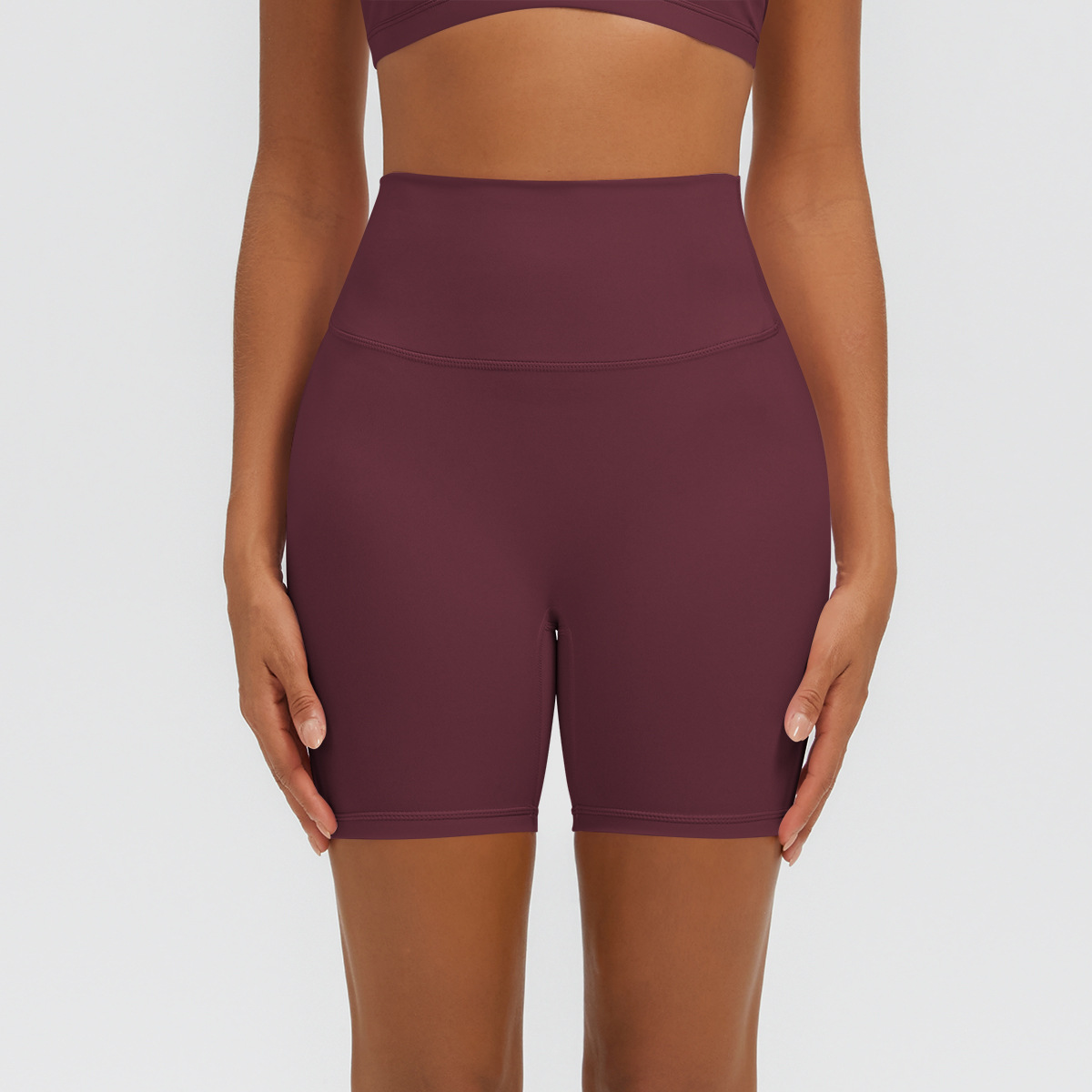 Nuevo tipo delgado de hielo, piel transpirable, ajustado, color sólido, ropa de yoga, pantalones cortos de tres puntos.