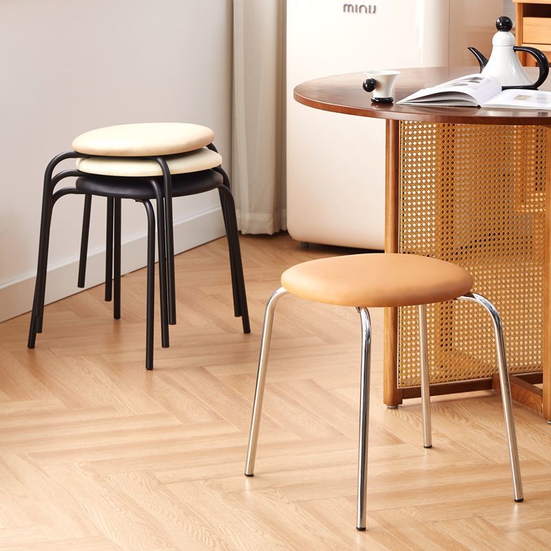 Silla de comedor doméstica simple silla de respaldo moderna retro nórdica silla de comedor de lujo pequeño tipo de alojamiento residencial se puede apilar mesa y silla de comedor