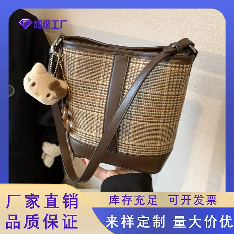 包包女2025夏季新款简约设计水桶包复古洋气手提时尚英伦风斜挎包