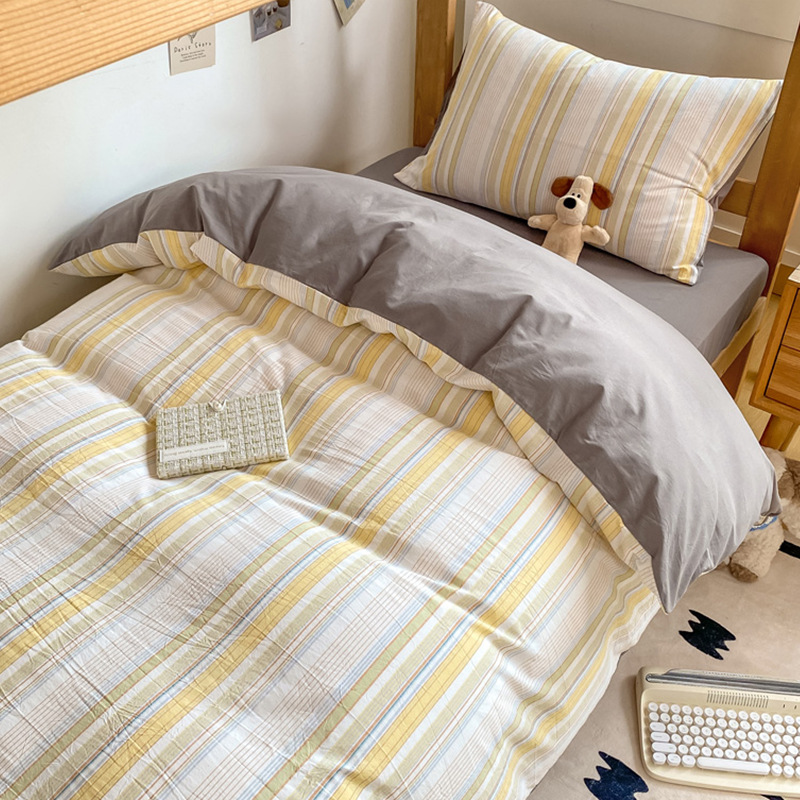 Juego de cama de dormitorio de estudiantes de algodón de tres piezas 2025 nueva funda de edredón de sábana de algodón individual Un juego completo de ropa de cama