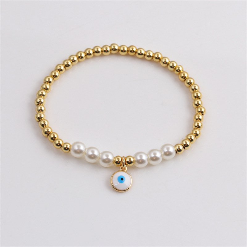 Korean copper-plated real gold dripping oil devilu0027s eye beads bracelet wholesale Nihaojewelry