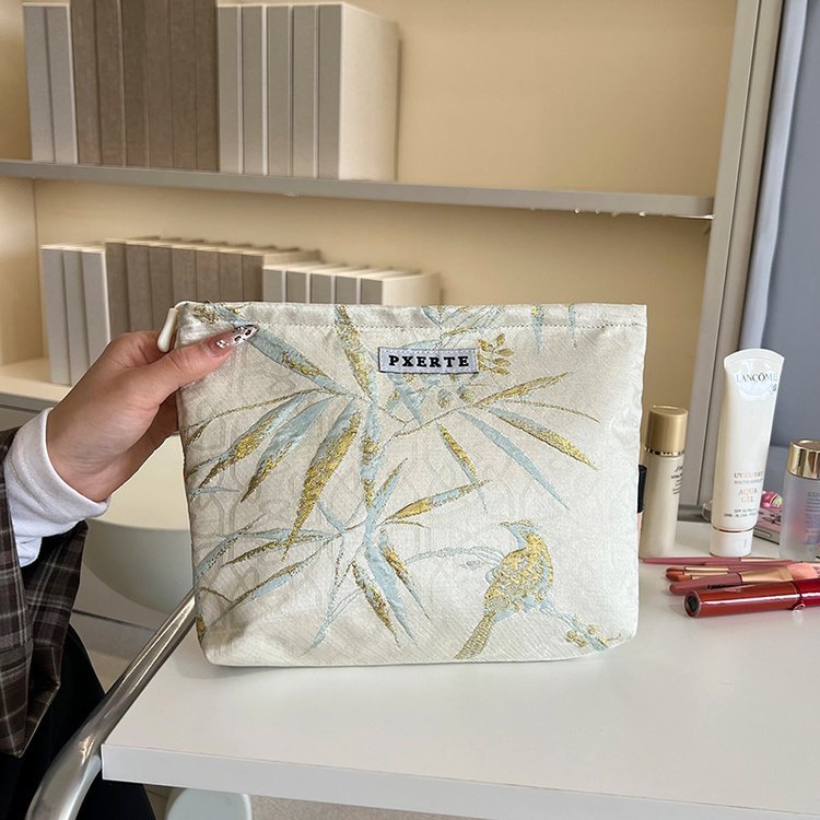 Bolsa de maquillaje de mariposa transfronteriza pequeña bolsa fresca portátil de cuidado de la piel bolsa de almacenamiento bolsa de lavado de viaje bolsa de lona bolsa de mano