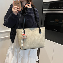 ファッションカジュアル大容量トートバッグ女性2025春の新型シンプルなショルダーバッグ通勤女性バッグ