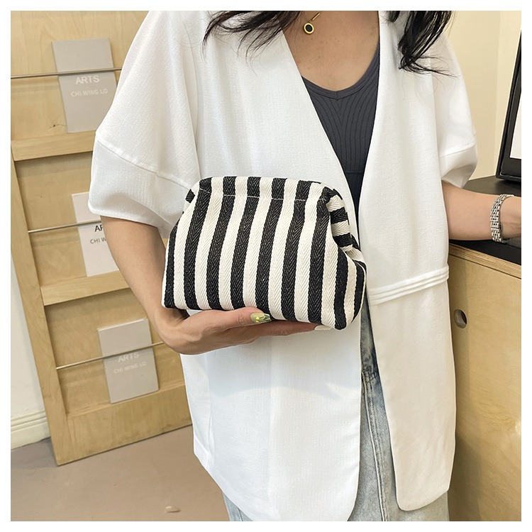 New cross-border fashion color-blocking striped cosmetic bag, women's loose change mobile phone storage bag, trendy and niche cloud clutch undefined