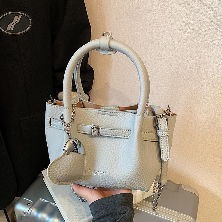 Tendencia versátil bolso de mano para mujeres 2025 nuevo estilo simple textura de transporte de tren mochila de alta calidad bolso de brazo de moda
