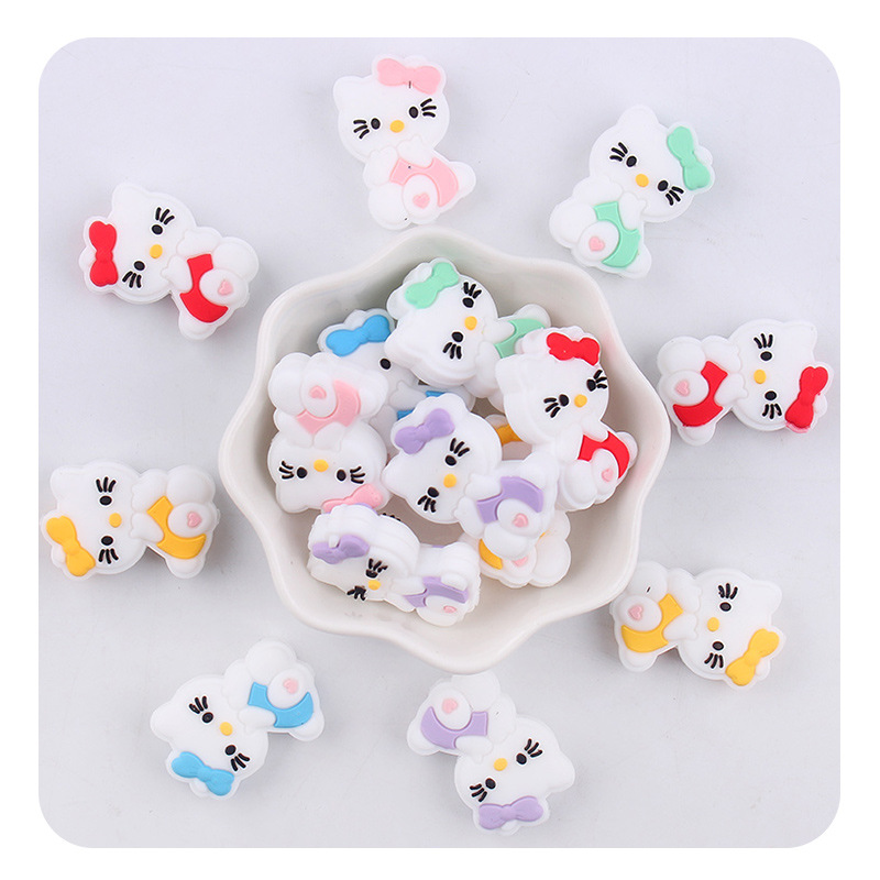 Productos creativos para bebés DIY dibujos animados animales karting gatos silicona bebé tetina cadena de dientes molares accesorios de pulsera de diente