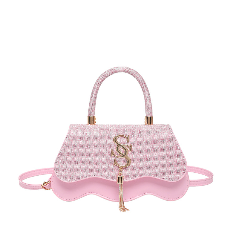 Bolsos cuadrados pequeños portátiles casuales Bolsos pequeños retro de moda para mujer 2025 primavera nueva moda casual popular bolso de mensajero