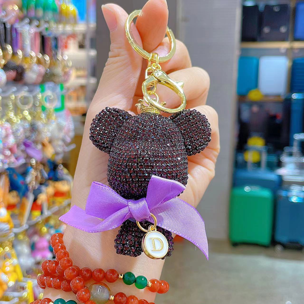 Venta directa de fábrica de lujo completo diamante muñeca llavero pajarita cabeza grande oso completo diamante bolsa colgante coche llavero