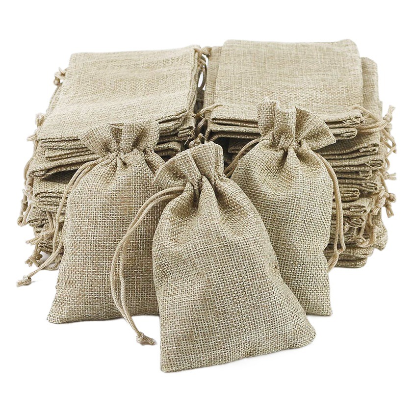 Los fabricantes transfronterizos en la bolsa de lino con cordón de stock bolsa de embalaje de lino de comercio exterior bolsa de regalo de yute bolsa de joyería