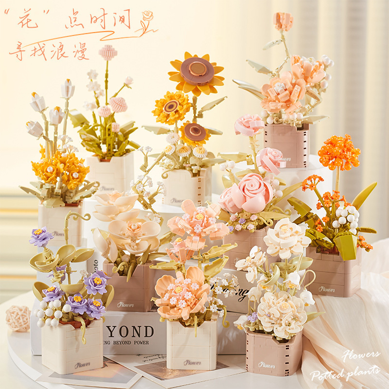 積み木の花がバラのオルゴールを飾っています。|undefined