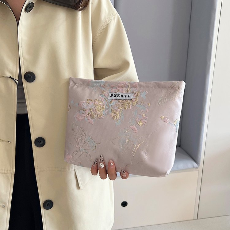 Bolsa de maquillaje de mariposa transfronteriza pequeña bolsa fresca portátil de cuidado de la piel bolsa de almacenamiento bolsa de lavado de viaje bolsa de lona bolsa de mano