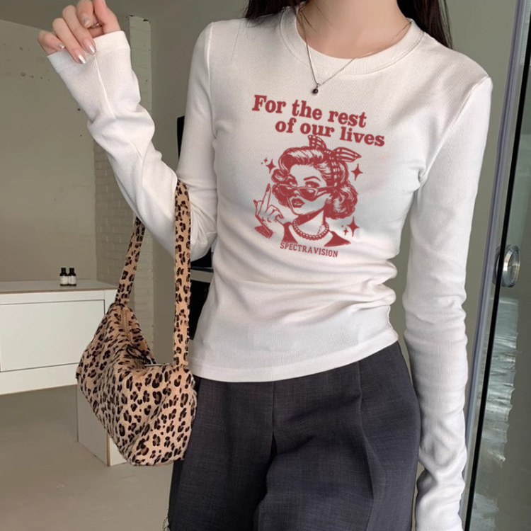 白色圆领正肩长袖T恤女装春秋新款美式卡通印花百搭修身辣妹上衣