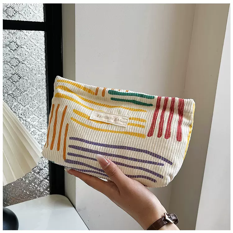 Ins小众帆布包撞色条纹化妆包便携旅行出差时尚百搭护肤品收纳袋