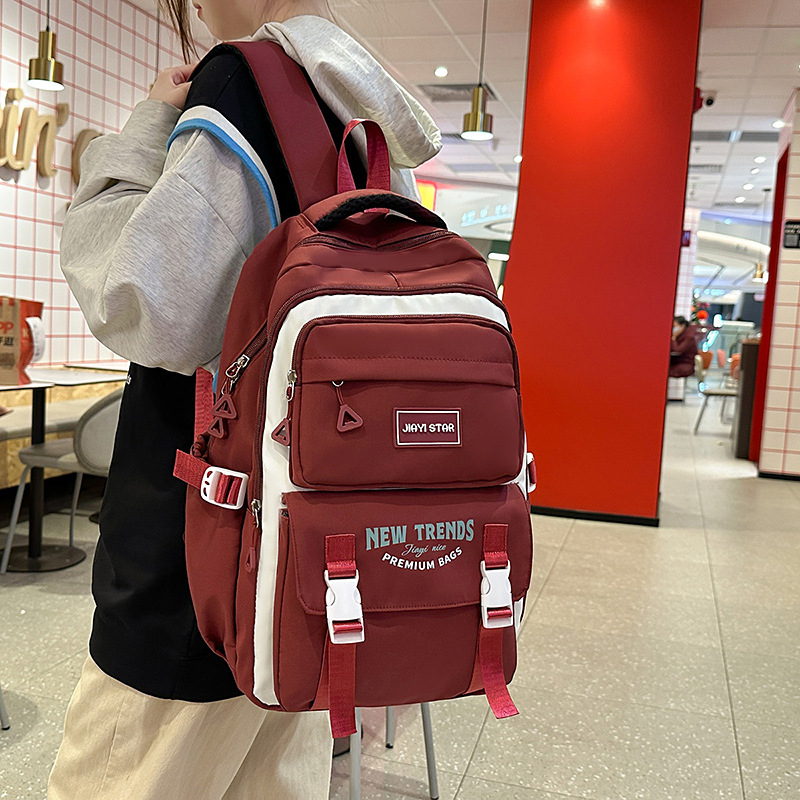 JIAYISTAR original mochila de hombro en venta caliente versátil para reducir la carga de la mochila de estudiantes de secundaria y secundaria, mochila de estudiantes universitarios