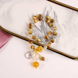 简约款时尚女式黄色虎眼石弹力手链异形水晶装饰水滴坠饰创意手饰