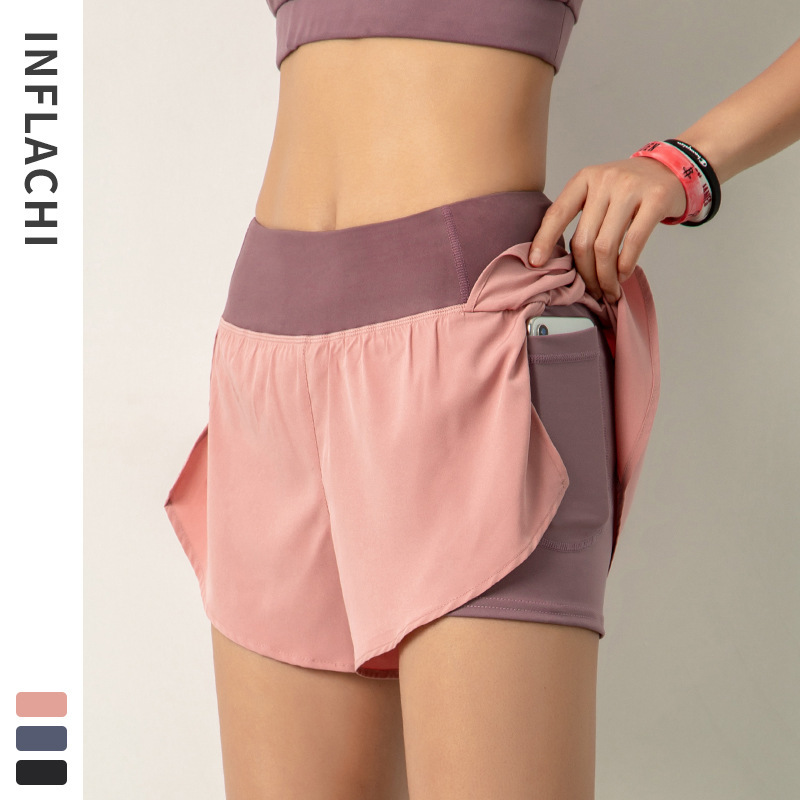 Pantalones cortos de yoga sueltos y anti-iluminación de alta gama pantalones cortos de secado rápido transpirables para mujer entrenamiento de carrera pantalones cortos de fitness de cintura alta verano