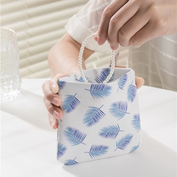 INS super popular bolsa de cosméticos de cuero portátil pequeña bolsa de almacenamiento de cojín de aire bolsa de auriculares airpod