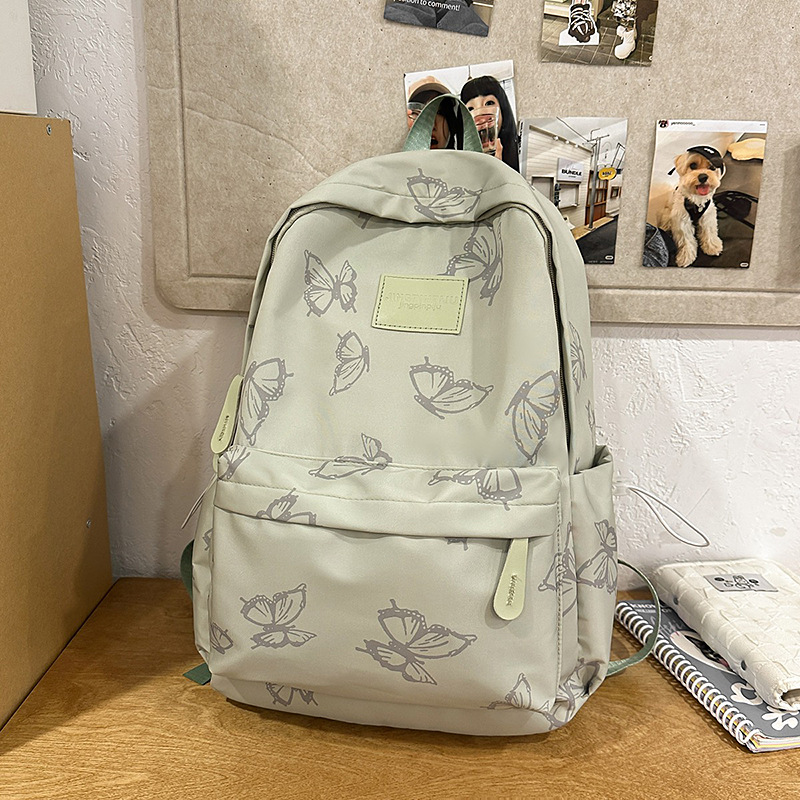 Mochila japonesa de nicho mariposa para mujeres, mochila de clase para estudiantes, mochila de viaje de ocio de gran capacidad para mujeres