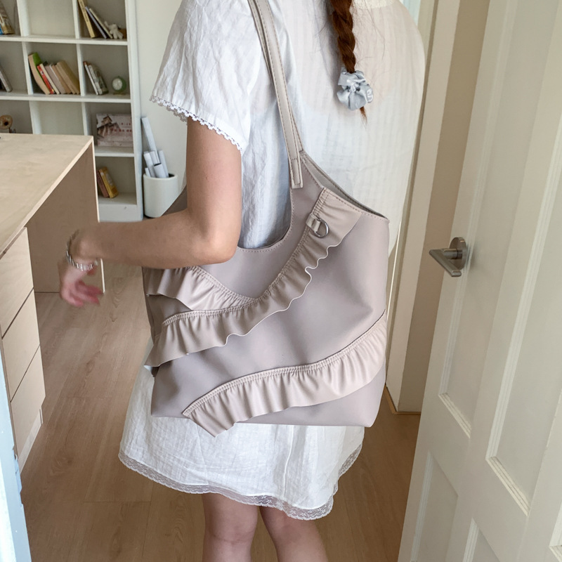 Versión coreana del bolso de nicho 2025 verano nuevo bolso femenino lindo bolso de encaje casual bolso de hombro de gran capacidad