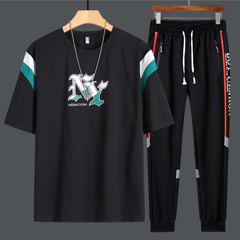 Set de mangas cortas para hombres de verano nuevo estilo de moda adolescente camiseta suelta con pantalones deportivos de tendencia casual de dos piezas