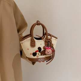 TOUtou时尚休闲小狗手提菜篮子包可爱水桶包2025新款单肩斜挎包女