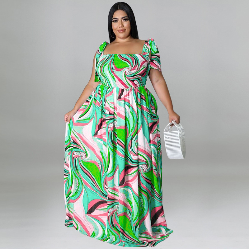 Maxi jurk met spaghettibandjes en smockwerk en strikprint_voghion.com