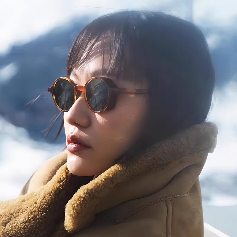 Nuevas gafas de sol de montura redonda de destello fino y moderno retro para hombres y mujeres Gafas de sol anti-ultravioleta de moda al aire libre de alta gama