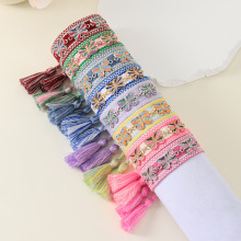 创意蝴蝶铆钉编织手链女欧美个性化幸运恶魔之眼手工流苏手绳批发