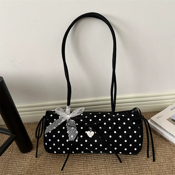 French-style niche baguette bag for women, 2026 new Korean version, high aesthetic casual polka dot bow shoulder commuter bag