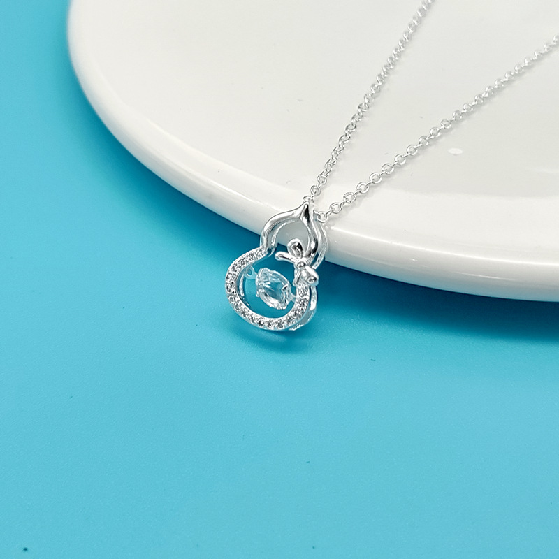 Collar de plata móvil de pulsación de lujo ligero nicho diseño de cadena de clavícula madre regalo de cumpleaños al por mayor